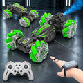 gesture control stunt drift RC car with 360° rotation, mist spray, LED lights, rechargeable battery, remote and wrist controller for kids.