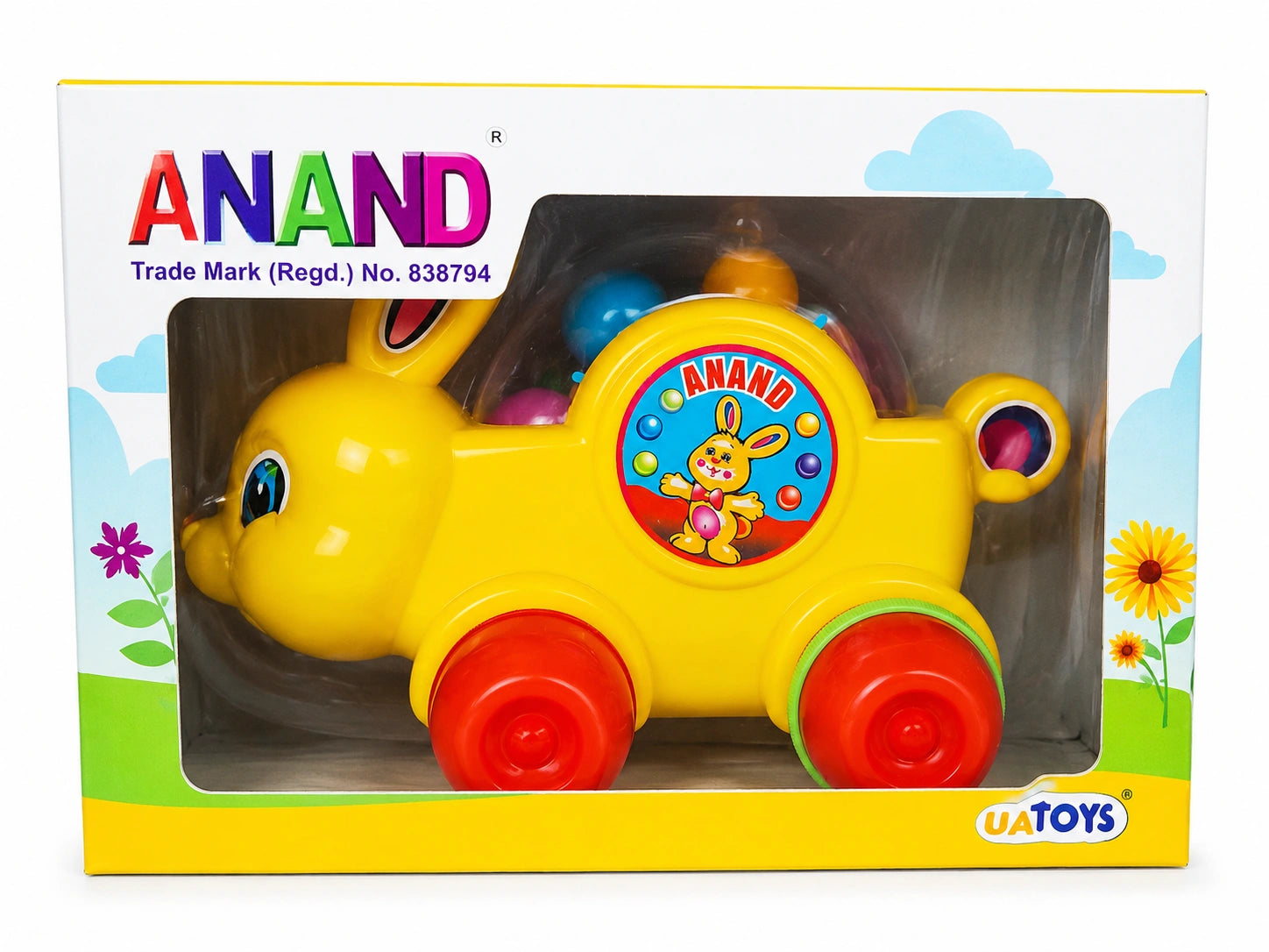 Yellow ANAND bunny toy car for kids with colorful wheels in box packing on white background.