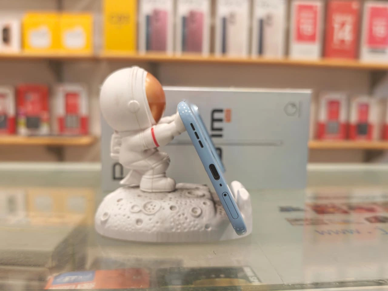 TECNO POVA Slim 5G Sky Blue smartphone front and back view with curved AMOLED display and dual camera setup at JJR Mobiles JJRMart.