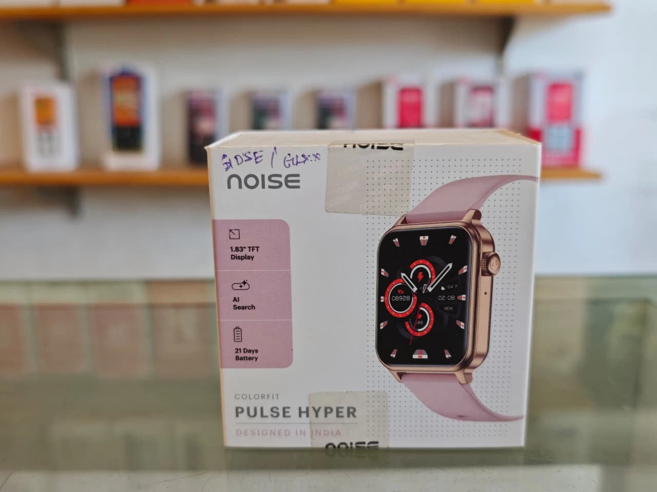 Noise ColorFit Pulse Hyper smartwatch with 1.83 inch TFT display and pink strap smartwatch box at JJR Mobiles