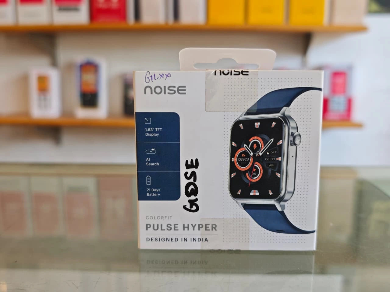 Noise ColorFit Pulse Hyper smartwatch with 1.83 inch TFT display and blue strap smartwatch box at JJR Mobiles