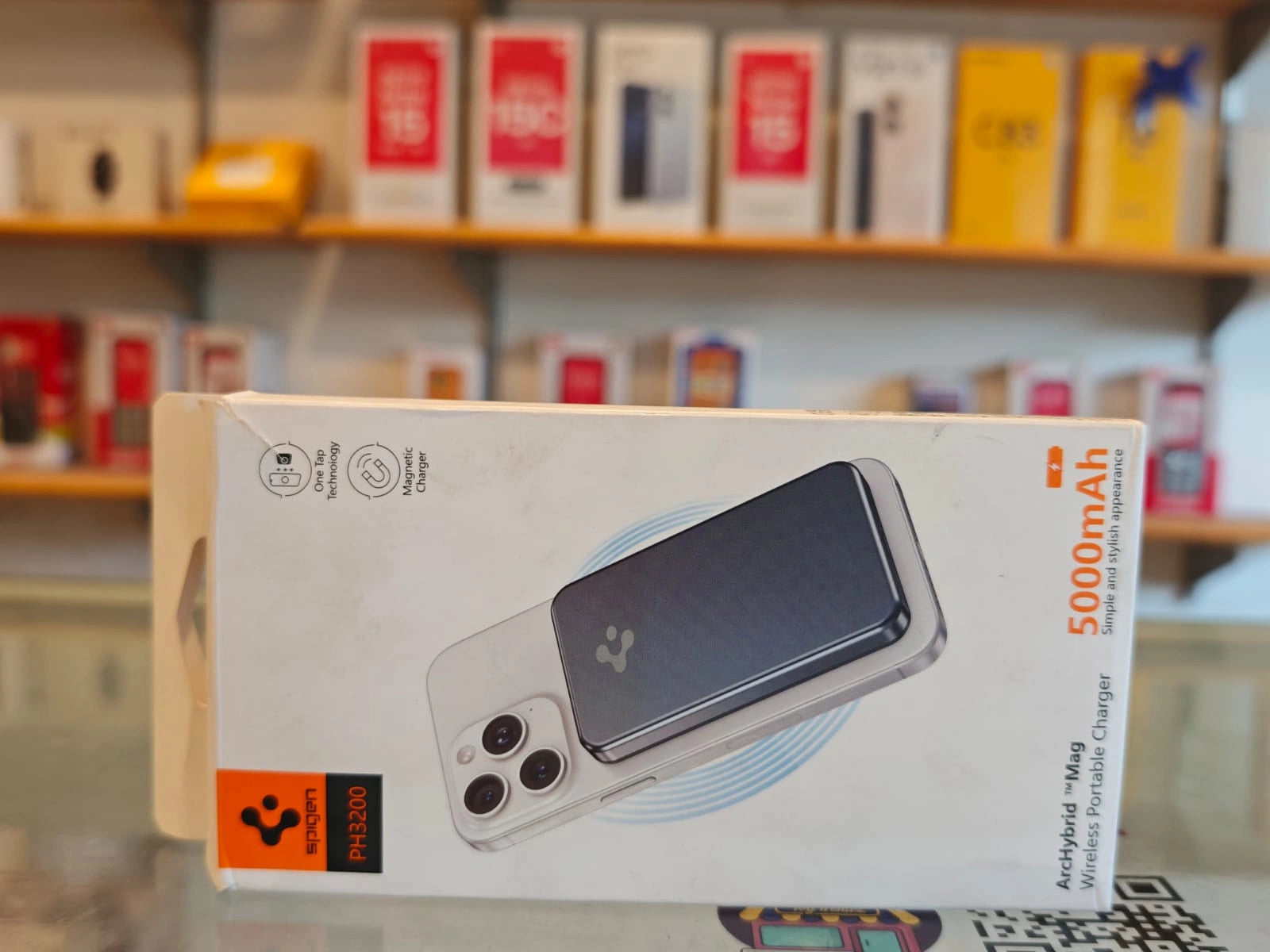 Spigen 5000mAh magnetic wireless power bank with MagSafe charging support and portable compact design in premium white box packaging.