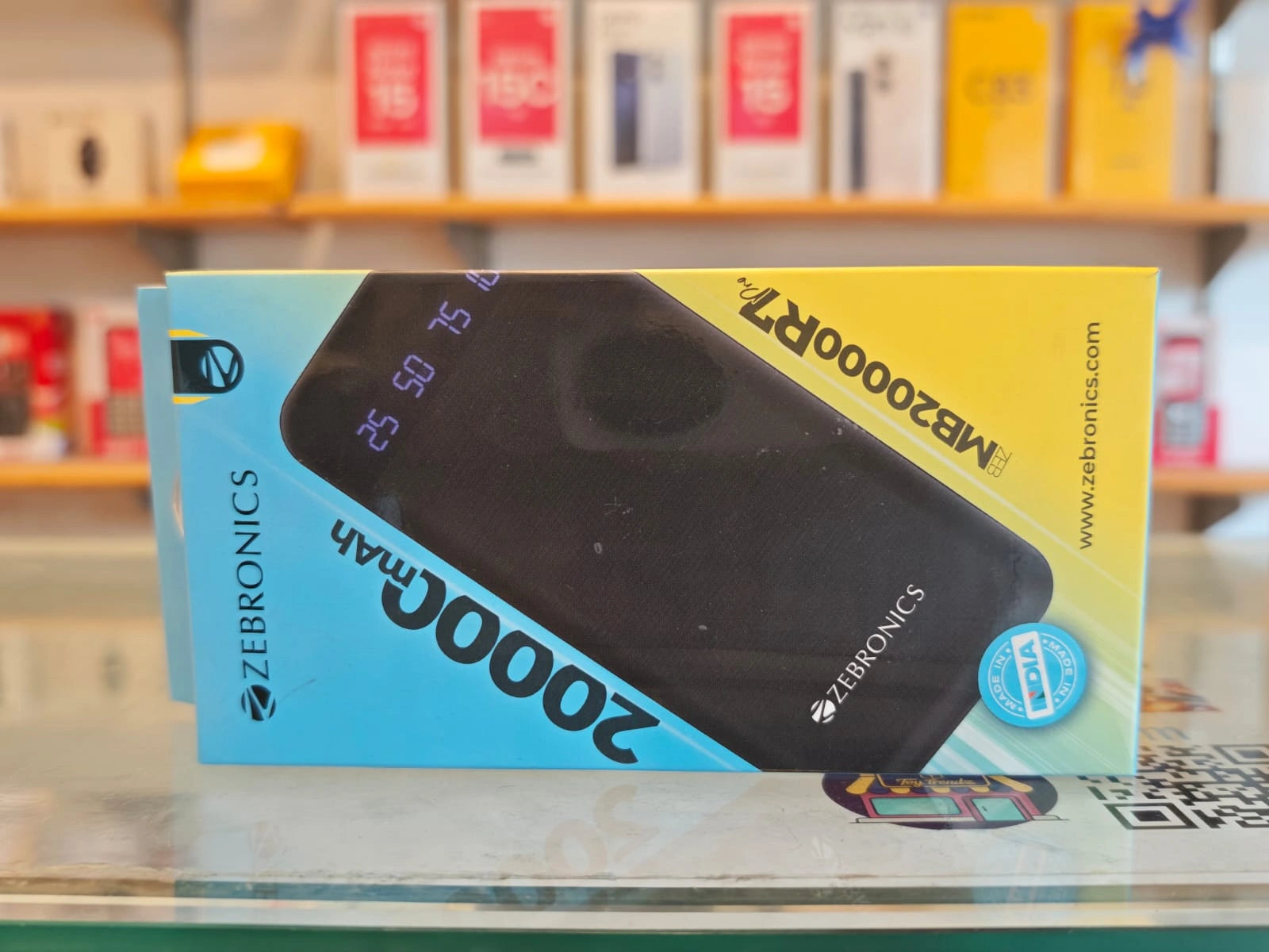 Zebronics R7 Pro 20000mAh power bank with LED battery display, dual USB output and fast charging support in premium retail packaging.
