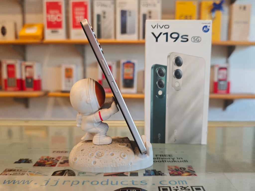 Vivo Y19s 5G smartphone in Titanium Gold color with retail box, featuring 4GB RAM, 64GB storage, Dimensity 6300 processor, 13MP AI camera, and 6000mAh battery.