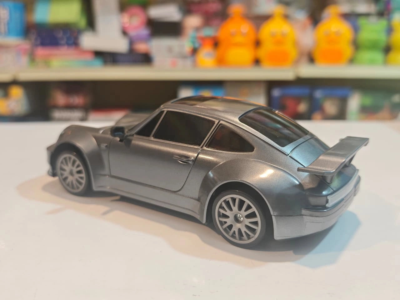 High-Speed Drift Racing RC Car with remote control, rechargeable battery, extra drift wheels, traffic cones and racing stickers available at Toy Trendz by JJR Mart Thoothukudi.