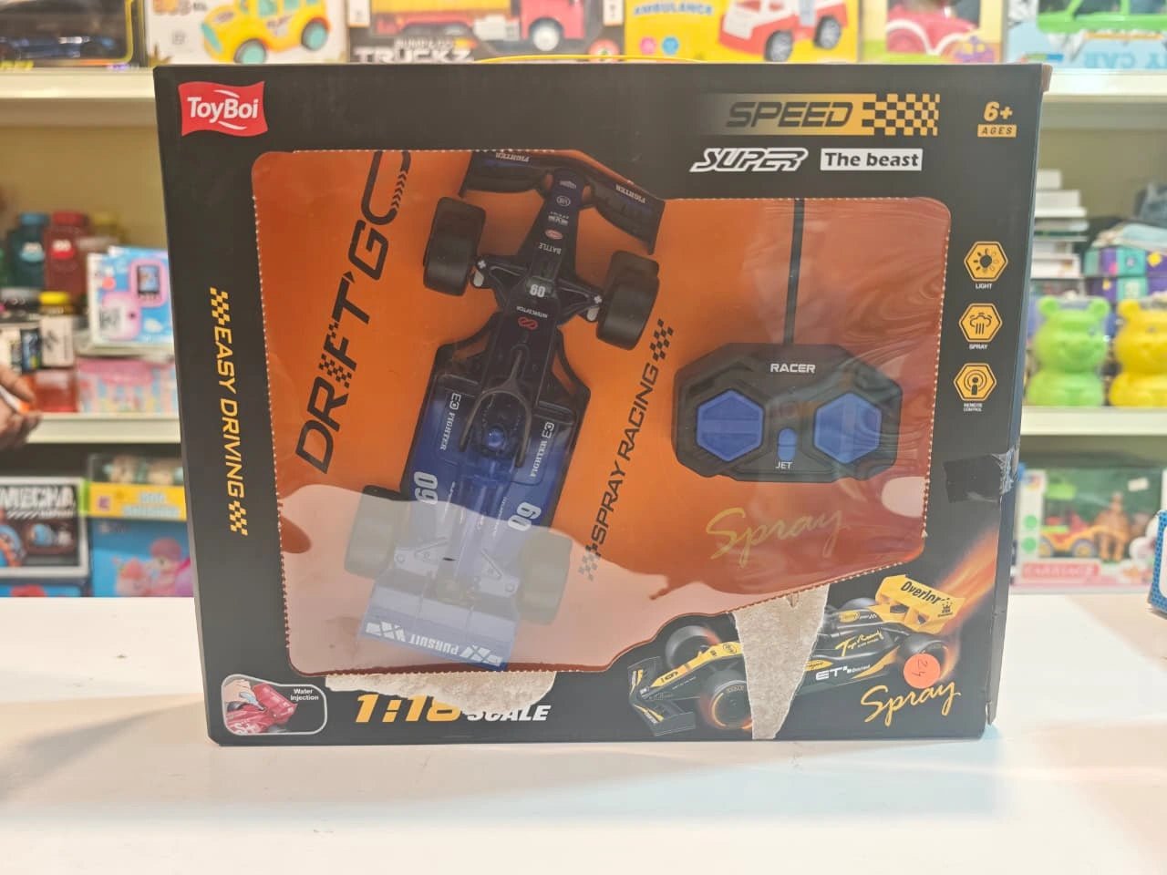 ToyBoi 1:18 Scale Formula Style RC Racing Car with spray smoke effect, LED lights, remote control and rechargeable battery available at Toy Trendz by JJR Mart Thoothukudi.