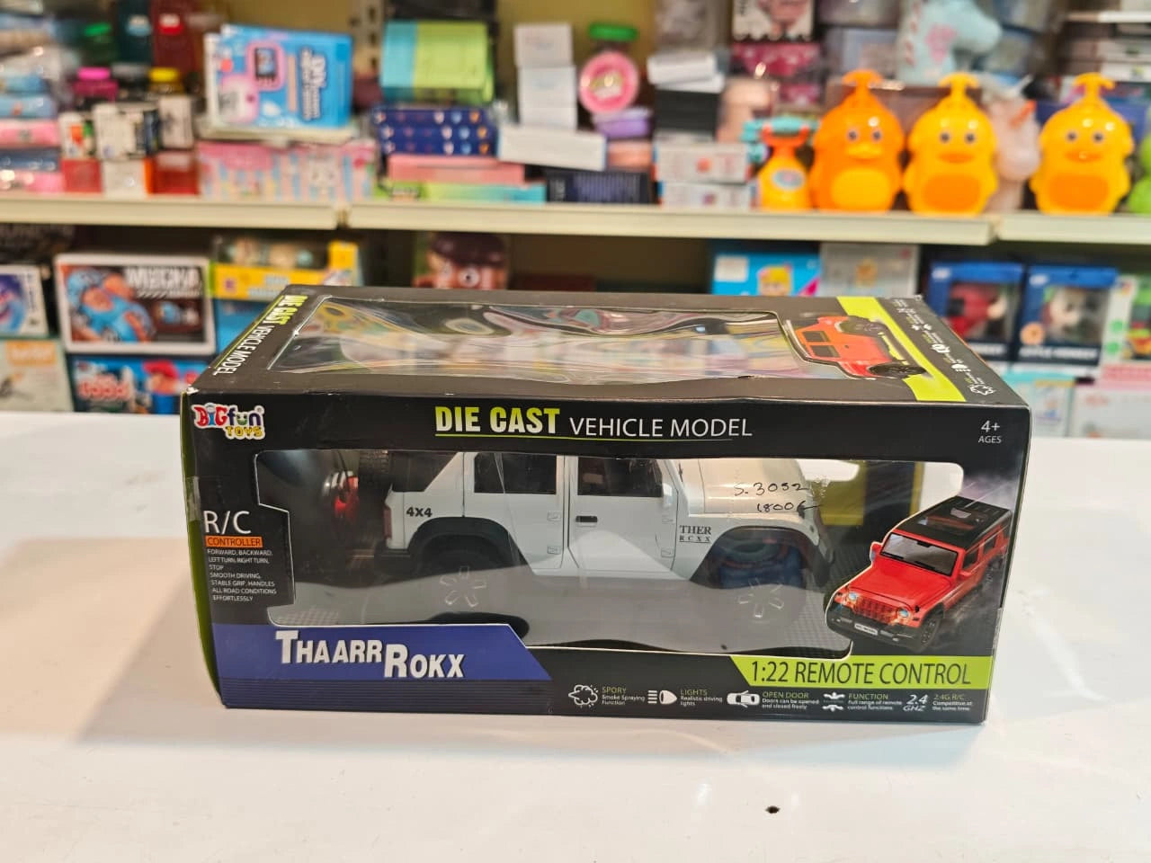 ThaarR Roxx 1:22 scale remote control 4x4 SUV with smoke spray effect, LED lights, opening doors and bonnet available at Toy Trendz by JJR Mart.