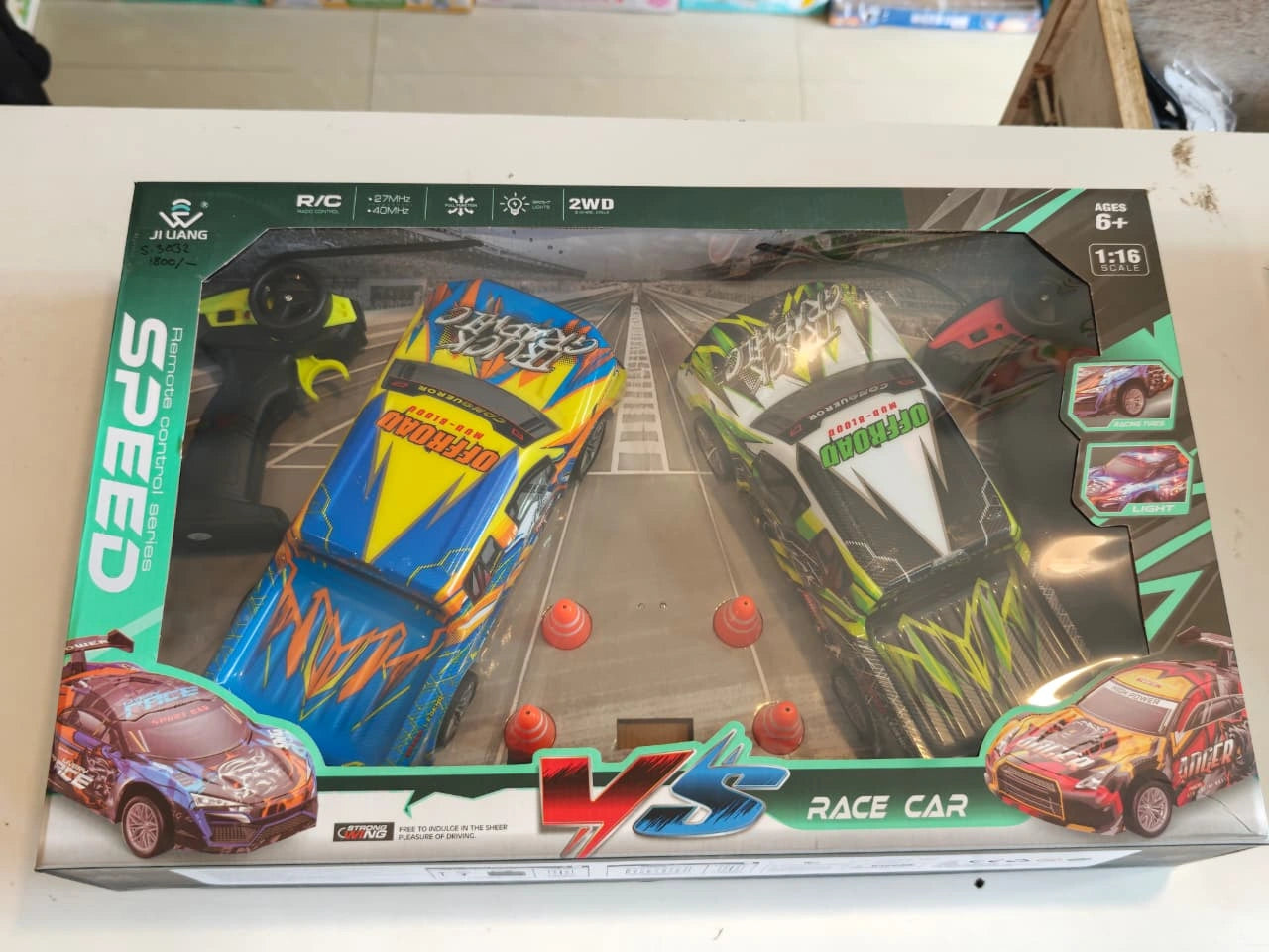 ToyBoi RC Racing Pickup Truck Set featuring two off-road racing trucks, traffic cones, signal light accessories, LED lights and remote control action available at Toy Trendz by JJR Mart Thoothukudi.