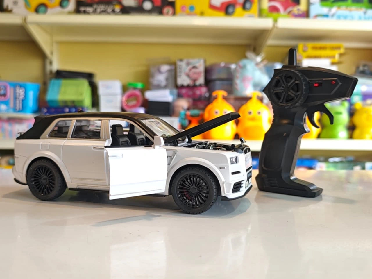 ToyBoi Famous Car luxury remote control SUV with opening doors, opening bonnet, LED lights and realistic premium SUV design available at Toy Trendz by JJR Mart Thoothukudi.