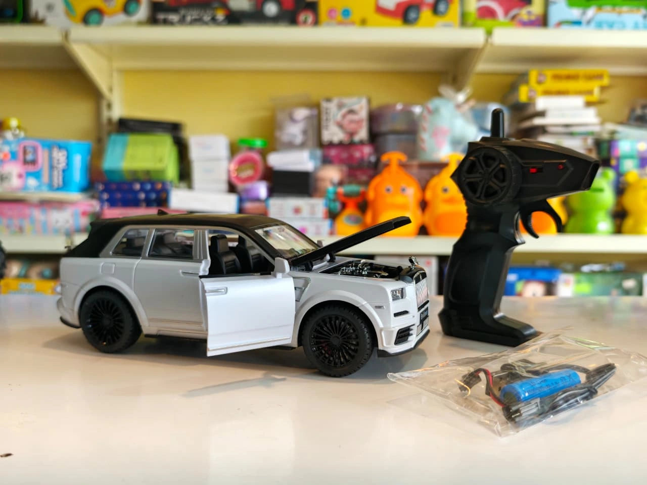 ToyBoi Famous Car luxury remote control SUV with opening doors, opening bonnet, LED lights and realistic premium SUV design available at Toy Trendz by JJR Mart Thoothukudi.