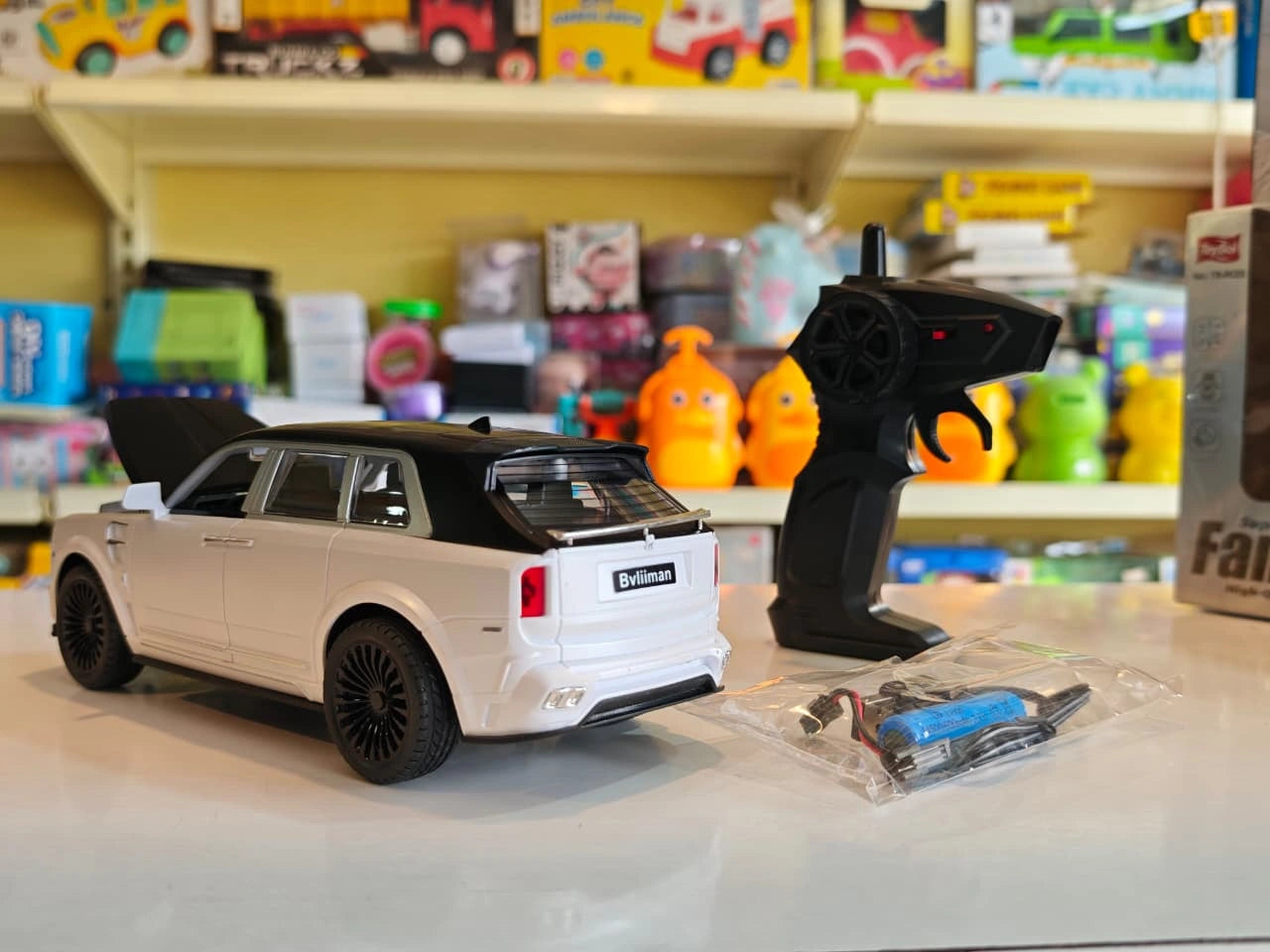 ToyBoi Famous Car luxury remote control SUV with opening doors, opening bonnet, LED lights and realistic premium SUV design available at Toy Trendz by JJR Mart Thoothukudi.