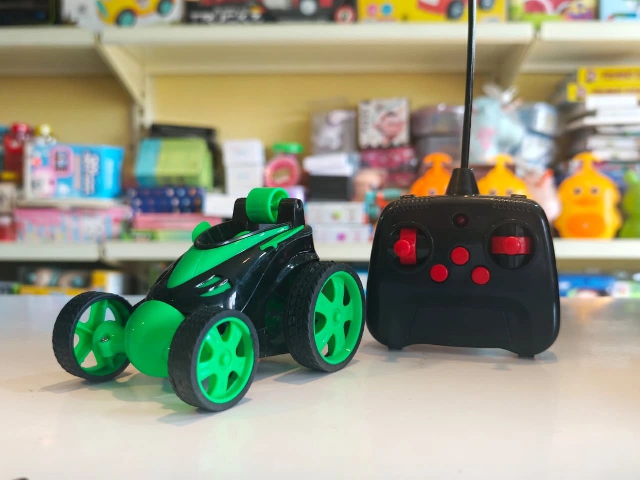 ToyBoi 360° Stunt RC Car with multi-directional movement, 360-degree spinning action, durable wheels and easy-to-use remote control available at Toy Trendz by JJR Mart Thoothukudi.
