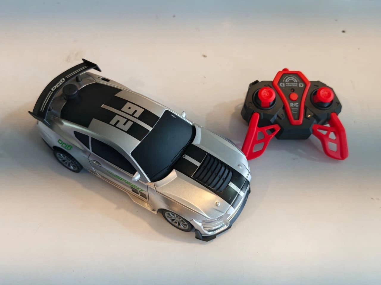 ToyBoi RC Turbo Spray Drift Car with realistic mist spray effect, LED lights, high-speed drifting and 2.4GHz remote control available at Toy Trendz by JJR Mart Thoothukudi.