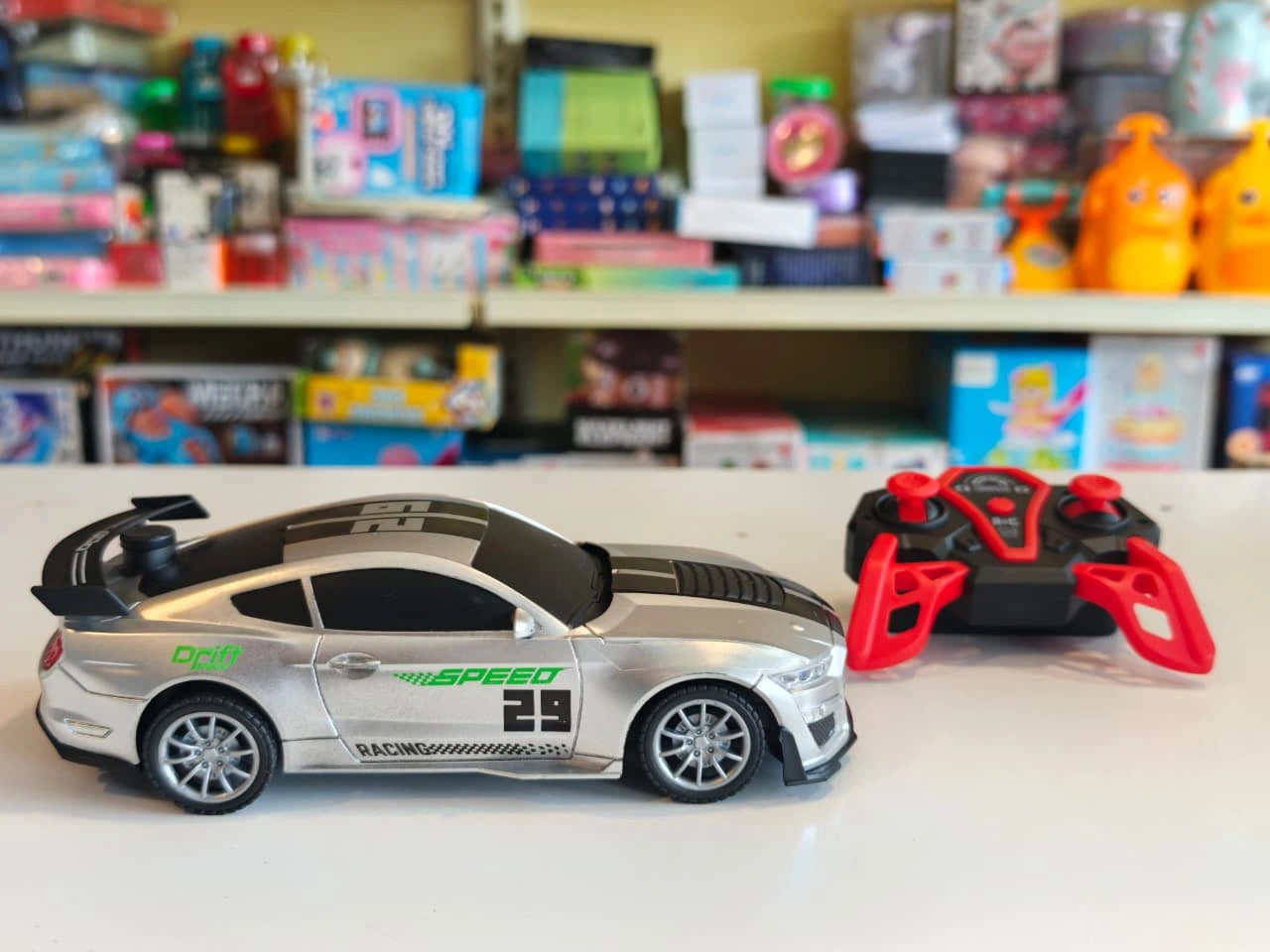 ToyBoi RC Turbo Spray Drift Car with realistic mist spray effect, LED lights, high-speed drifting and 2.4GHz remote control available at Toy Trendz by JJR Mart Thoothukudi.