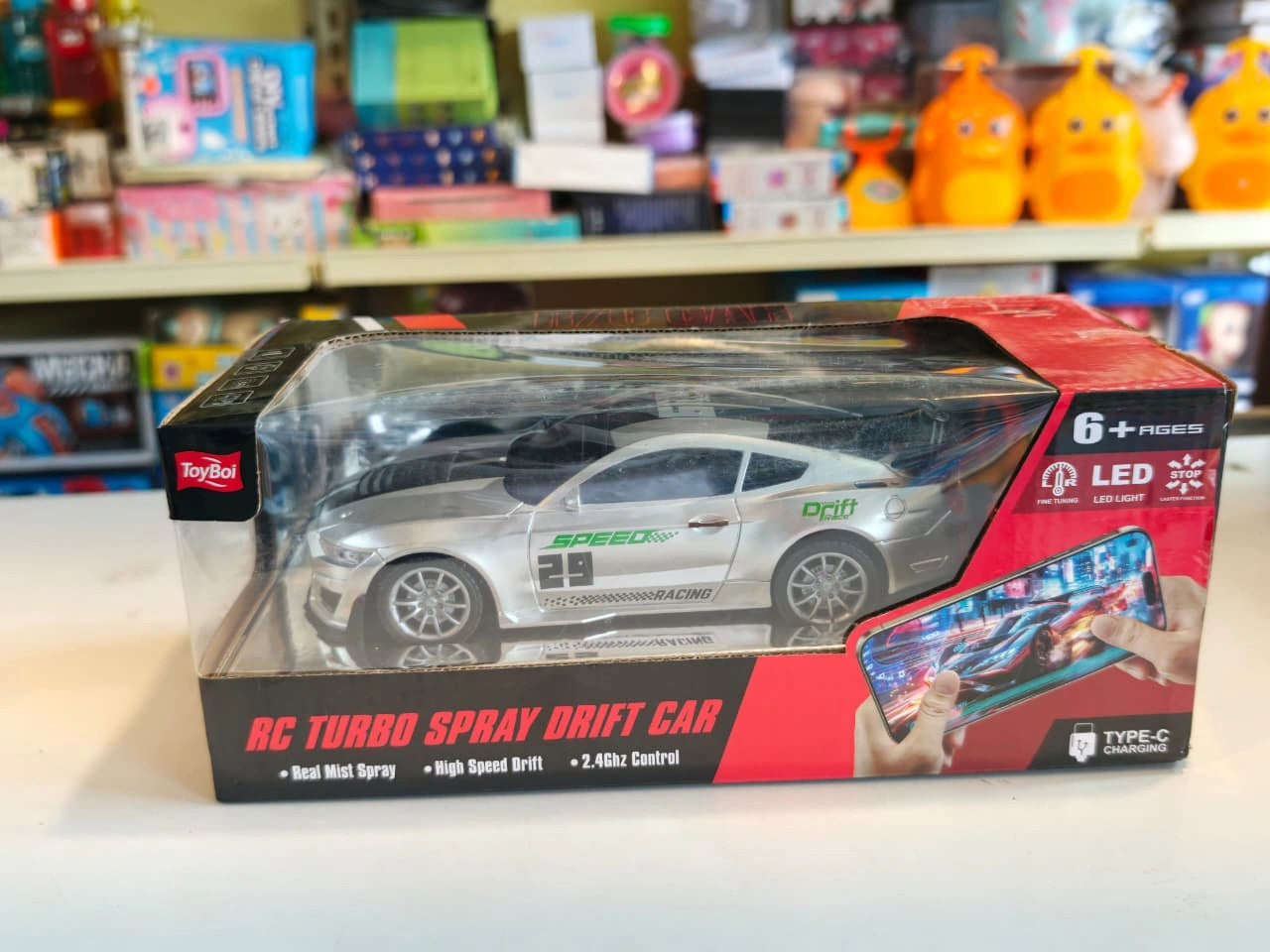 ToyBoi RC Turbo Spray Drift Car with realistic mist spray effect, LED lights, high-speed drifting and 2.4GHz remote control available at Toy Trendz by JJR Mart Thoothukudi.