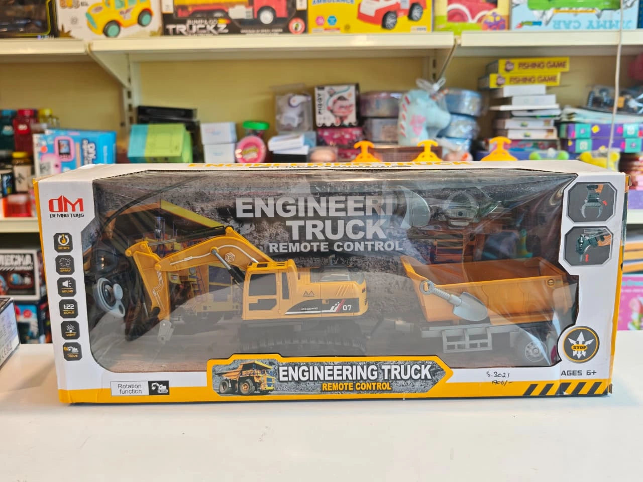 Remote Control Engineering Excavator with tracked wheels, movable digging arm, detachable dump trailer and wireless controller available at Toy Trendz by JJR Mart Thoothukudi.