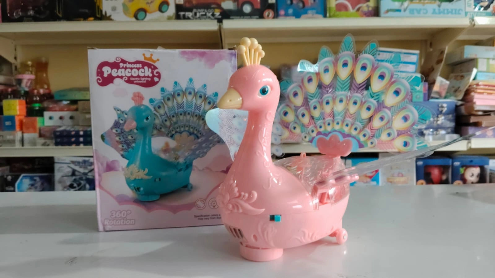 Musical Peacock Bird Toy with Colourful LED Lights, 360° Rotation & Music for Kids | Toy Trendz JJR Mart
